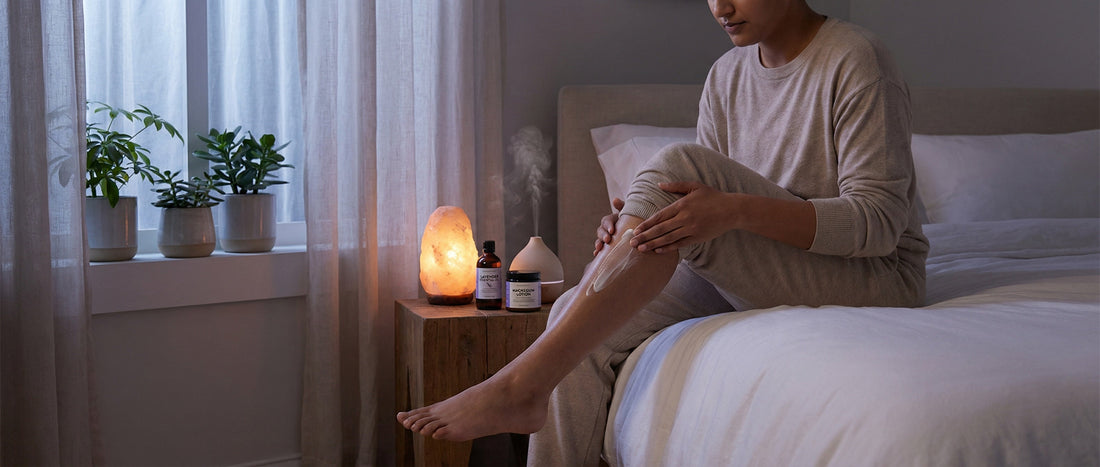 Indian adult following a calming bedtime body routine using magnesium on calves and lavender aromatherapy for deeper sleep