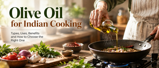 Olive oil being poured into a pan for Indian cooking with spices and fresh ingredients.
