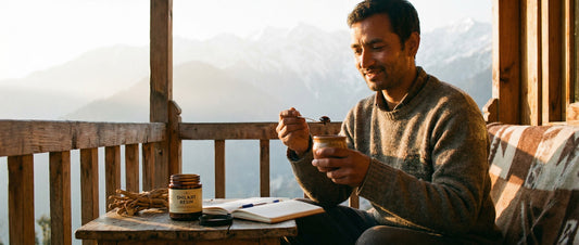 Indian man preparing a daily dose of pure Shilajit resin with warm milk to illustrate the consistency needed to see results for energy and stamina.