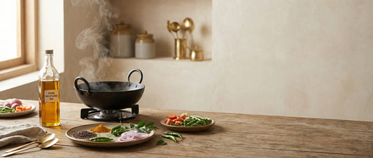 Mustard oil heating in a kadai with Indian cooking ingredients, showing smoke point for shallow frying in a home kitchen
