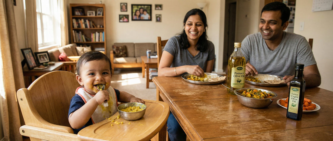 Indian baby eating khichdi cooked in pomace olive oil during a family meal to show safety and proper usage.