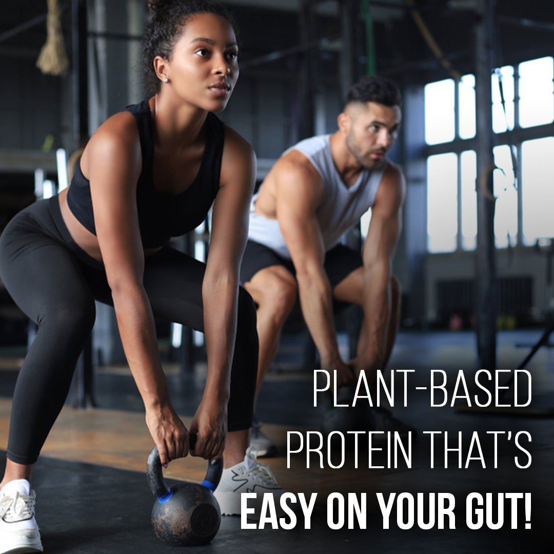 Two adults performing kettlebell exercises at the gym, highlighting the benefits of plant-based protein for muscle recovery, strength, and easy digestion.