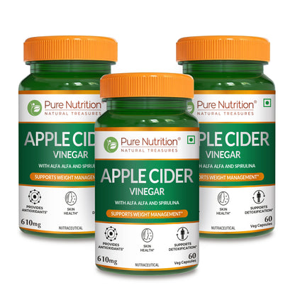 Three bottles of Pure Nutrition Apple Cider Vinegar capsules formulated with alfalfa, spirulina and wheatgrass.