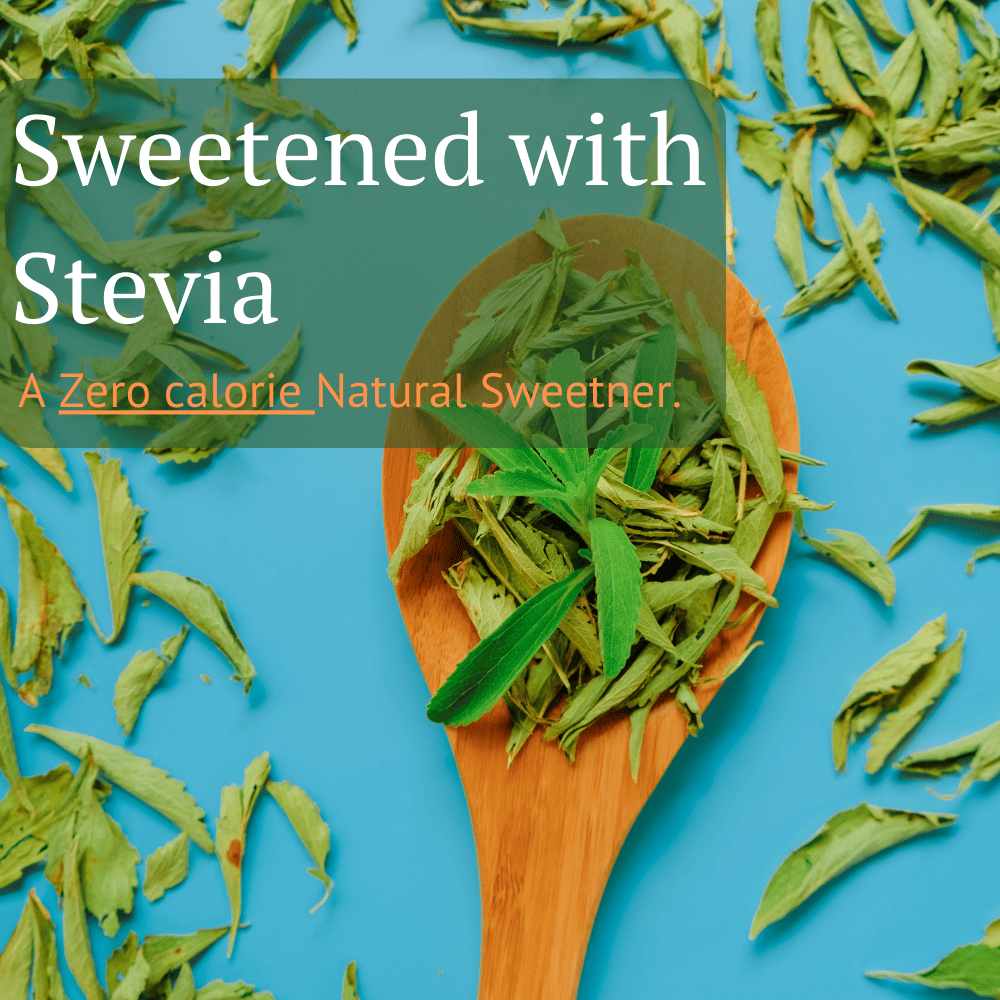 Fresh and dried stevia leaves in a wooden spoon, representing a natural zero-calorie sweetener used in plant-based protein and healthy nutrition.